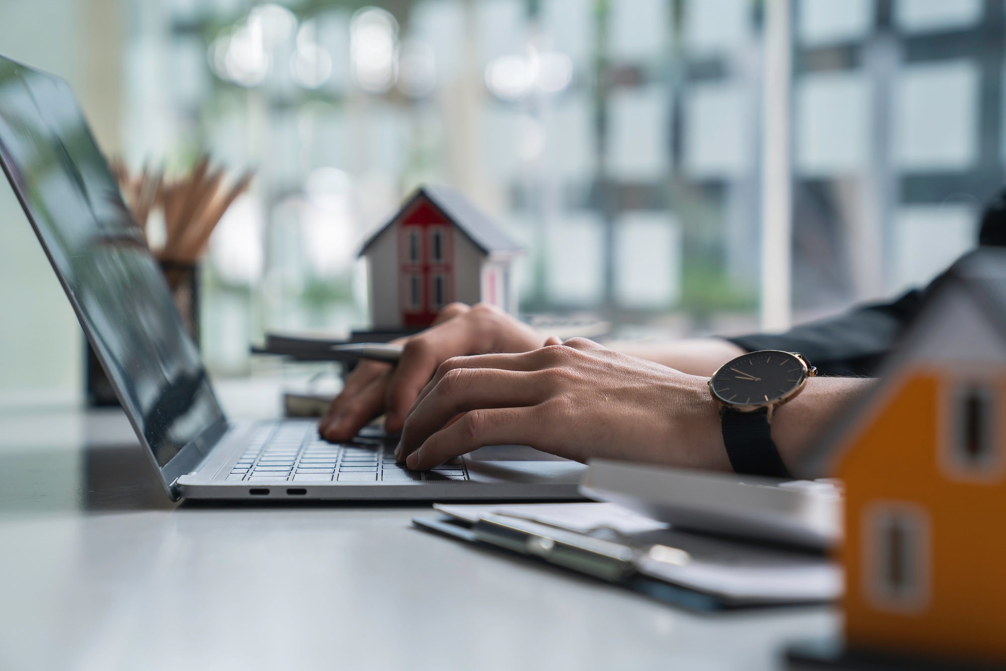 Real estate, buy house concept, Real estate agents are printing house purchase contract documents. a